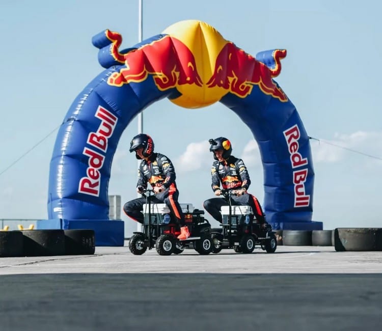 Red Bull event showing two people on mini-bikes
