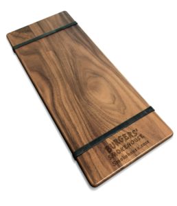 Solid walnut wood menu board with rubber bands and laser-engraved logo