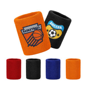 Orange sweat-wicking basketball wristband with embroidered team logo patch