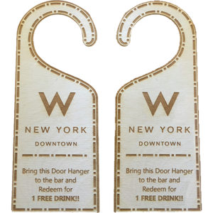 Laser engraved wood door hanger offering a free drink redemption at the hotel bar
