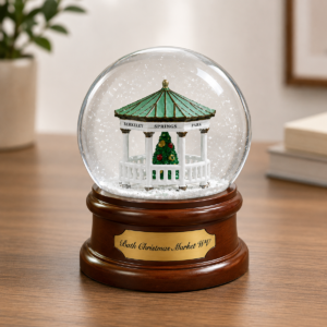 Custom snow globe with a gazebo scene on a wood base and a gold name plaque