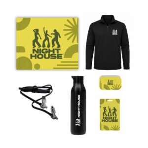Global Traveler onboarding kit with quarter zip, tracker card, bottle, and earbuds