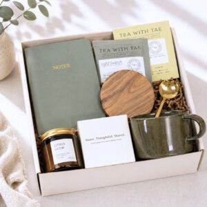Luxury Tea & Journal welcome kit with mug, teas, candle, journal, and gold tea spoon